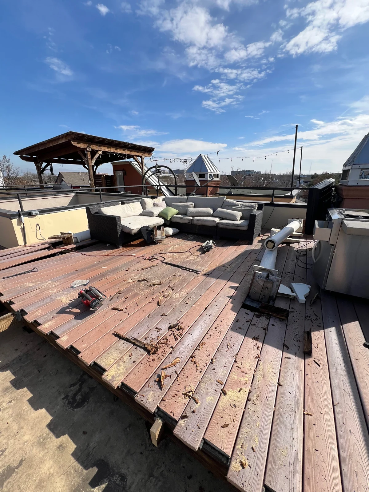 Wood rooftop deck during demolition in Dallas before removal