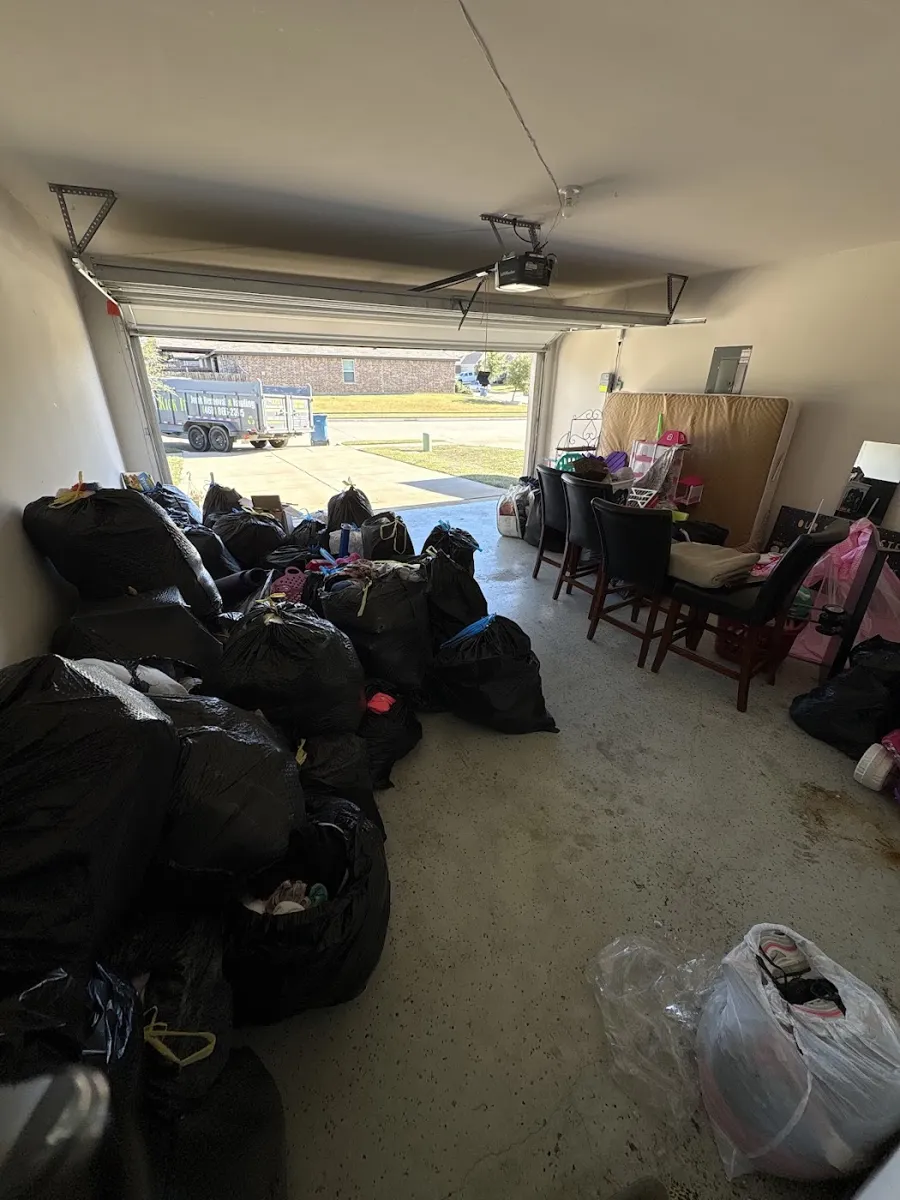 Before photo of garage cleanout posted by Aliyah Walker in a Google review of Kick It Junk Removal