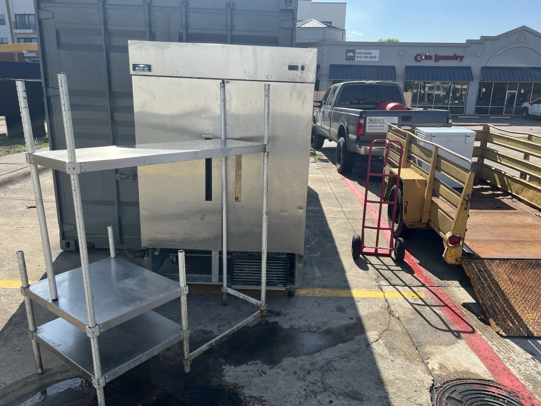 Commercial kitchen equipment removed during a Kick It commercial cleanout