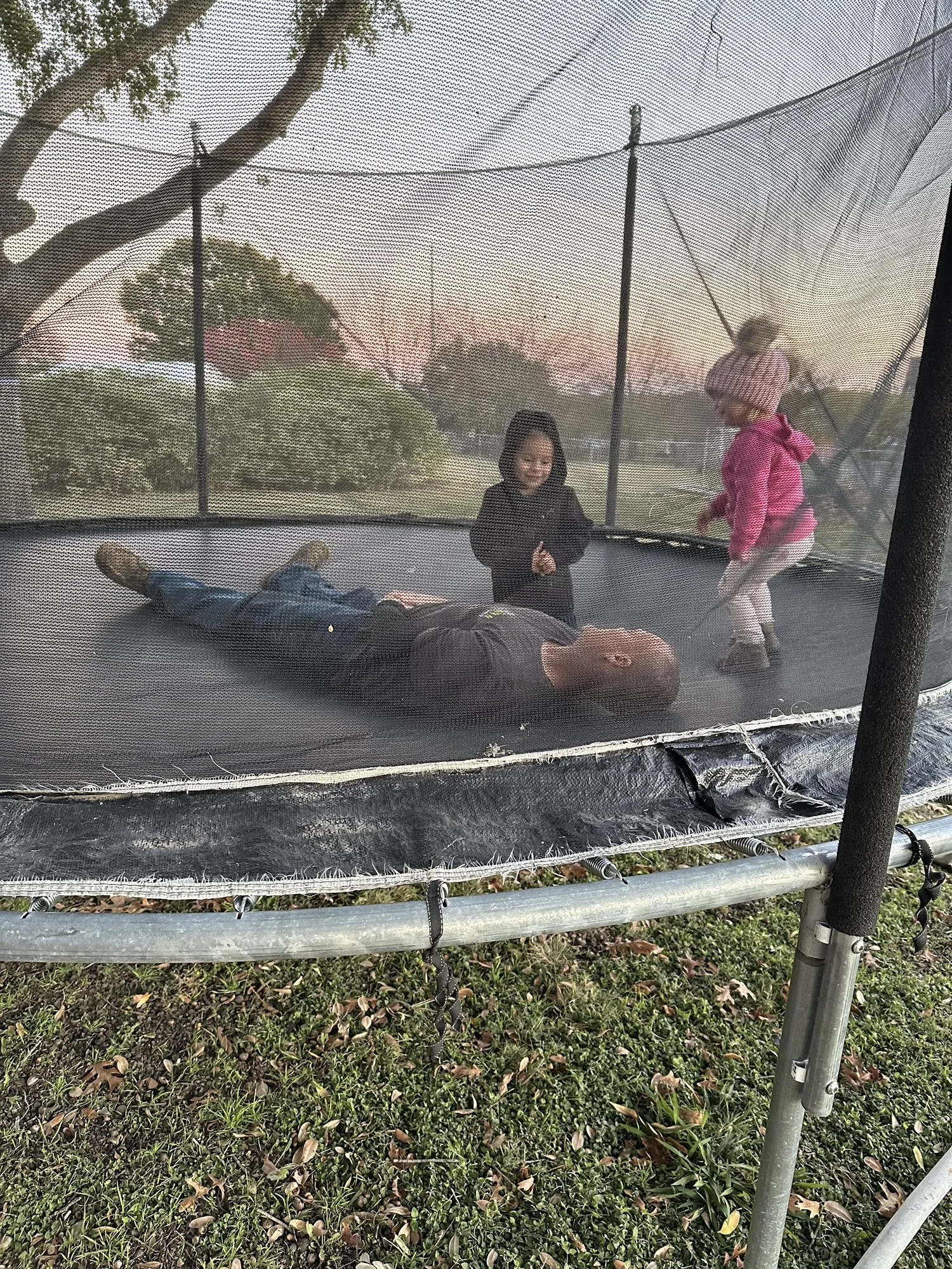 Repurposed trampoline enjoyed by the Kick It family's kids