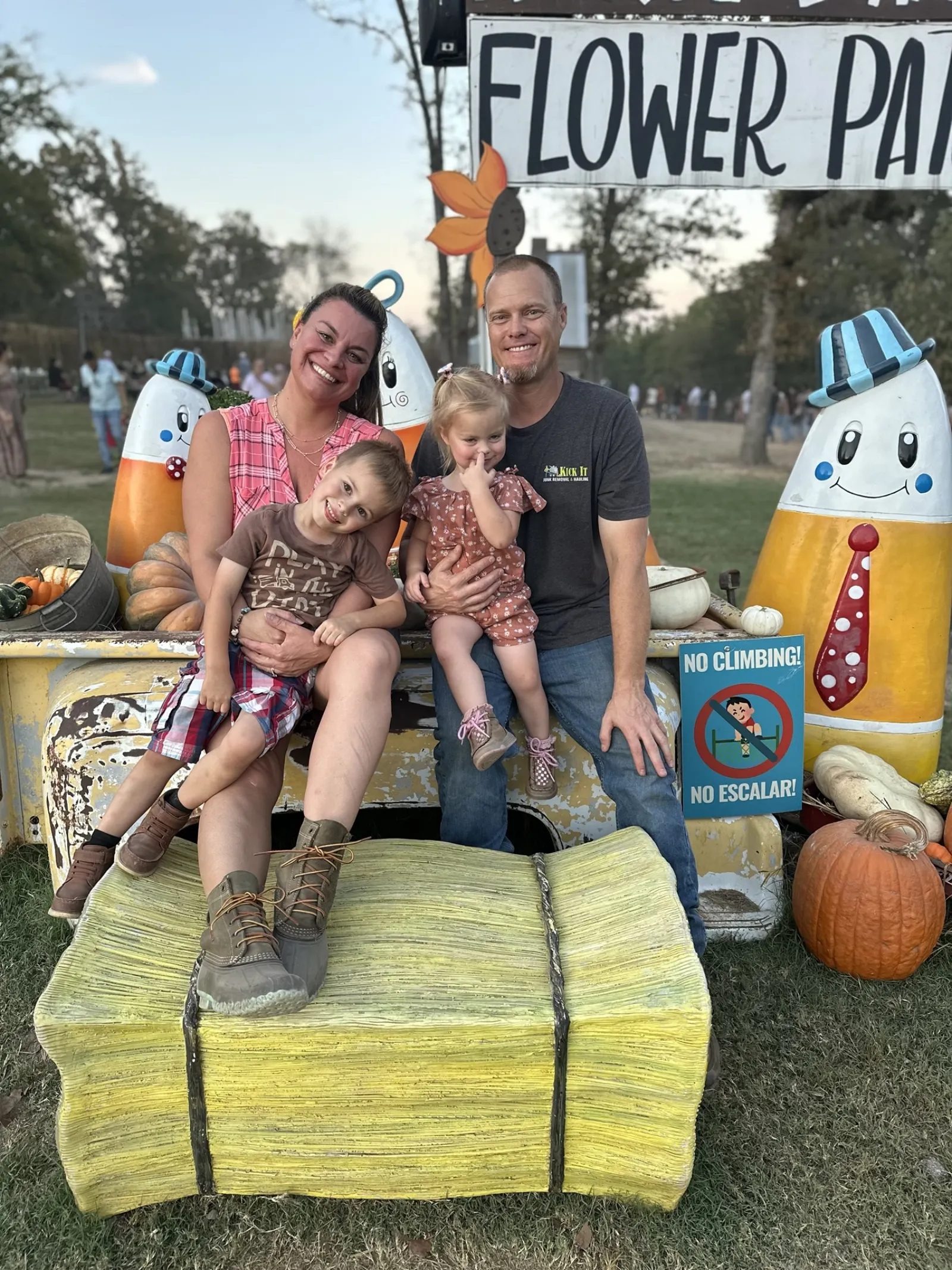 Paul, Jenn and the kids at a fall flower patch in North Texas