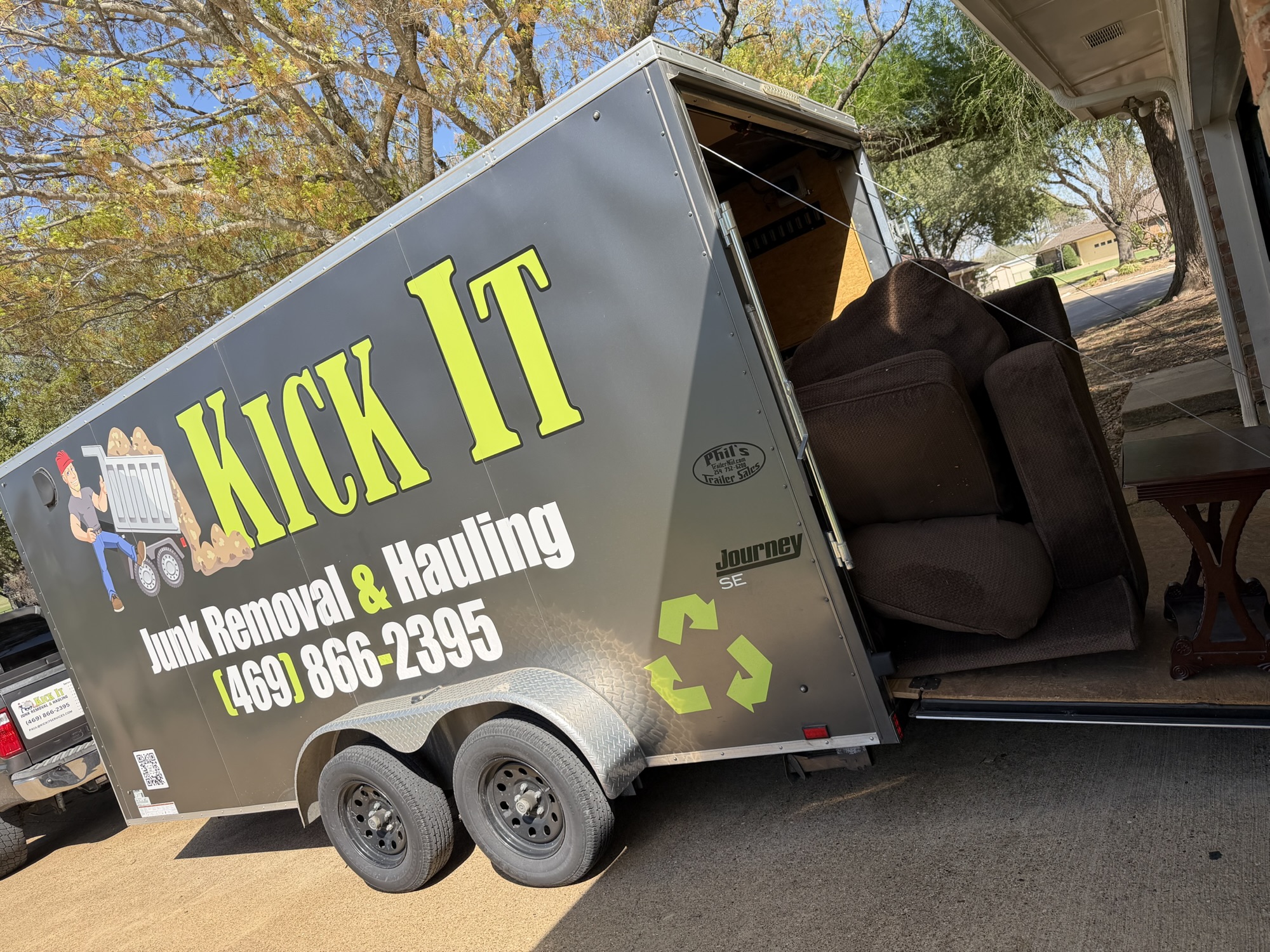 Furniture loaded on the bed of the Kick It trailer