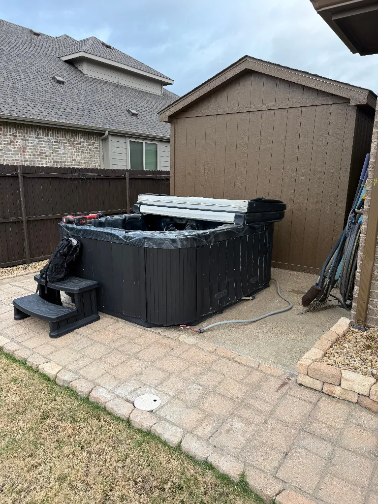Before photo of hot tub removal in forney posted by LaRue V Gillespie in a Google review of Kick It Junk Removal