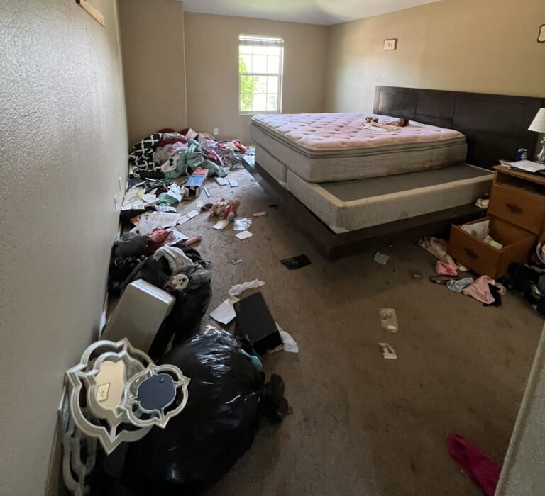 Mattress and bed items loaded for disposal