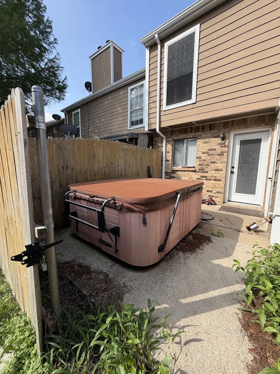 Before photo of hot tub removal posted by Paula Prentice in a Google review of Kick It Junk Removal
