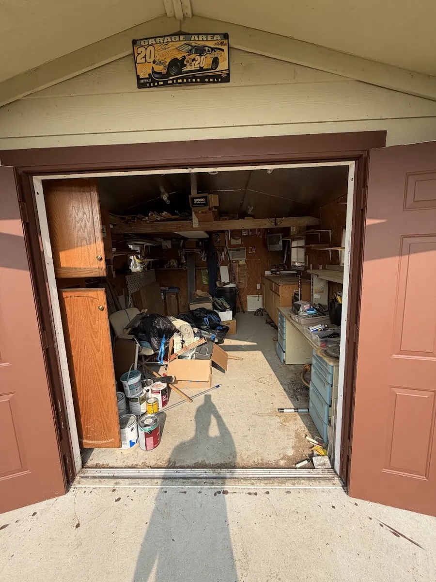 Before photo of shed cleanout posted by Terri Sommerfeldt in a Google review of Kick It Junk Removal